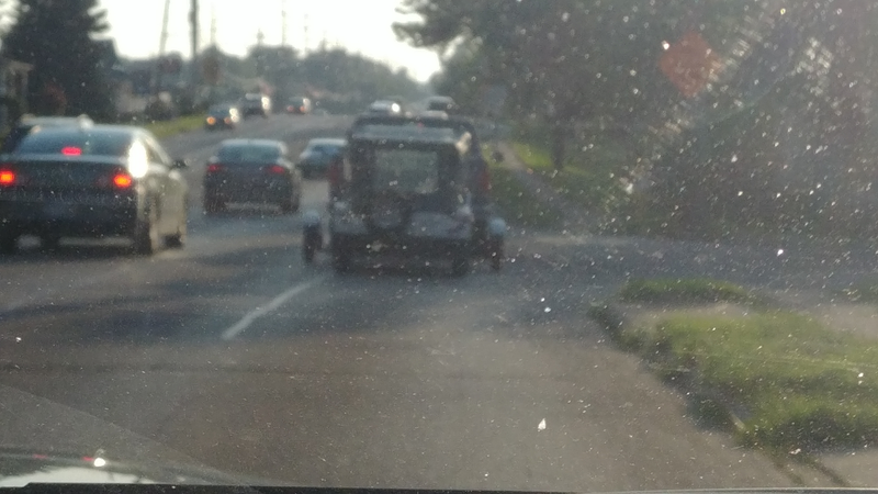 The Moke on a dolly, heading to the museum